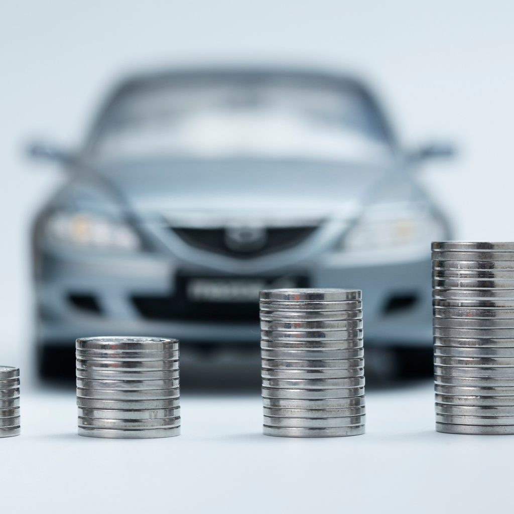 KFZ Gutachter Zentrale | coin stacks front car KFZ Gutachter Zentrale